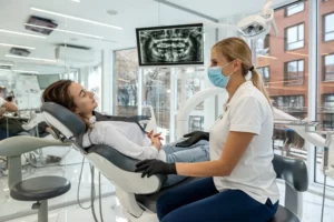 The dentist at Andrew Baderski Dental is explaining the Xray result to the patient